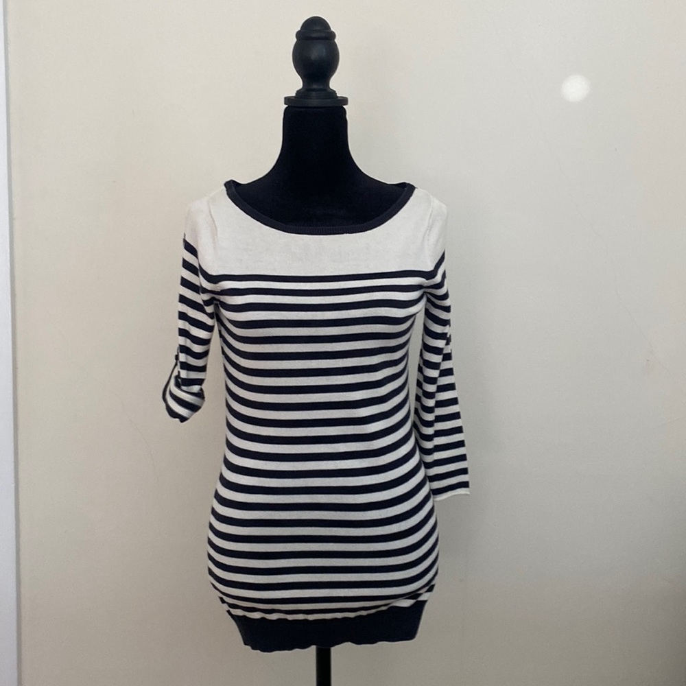 Black and white horizontally lined sweater. Sleeve can be rolled or left down.